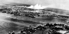 Torpedo planes attack "Battleship Row" at about 0800 on 7 December, seen from a Japanese aircraft.